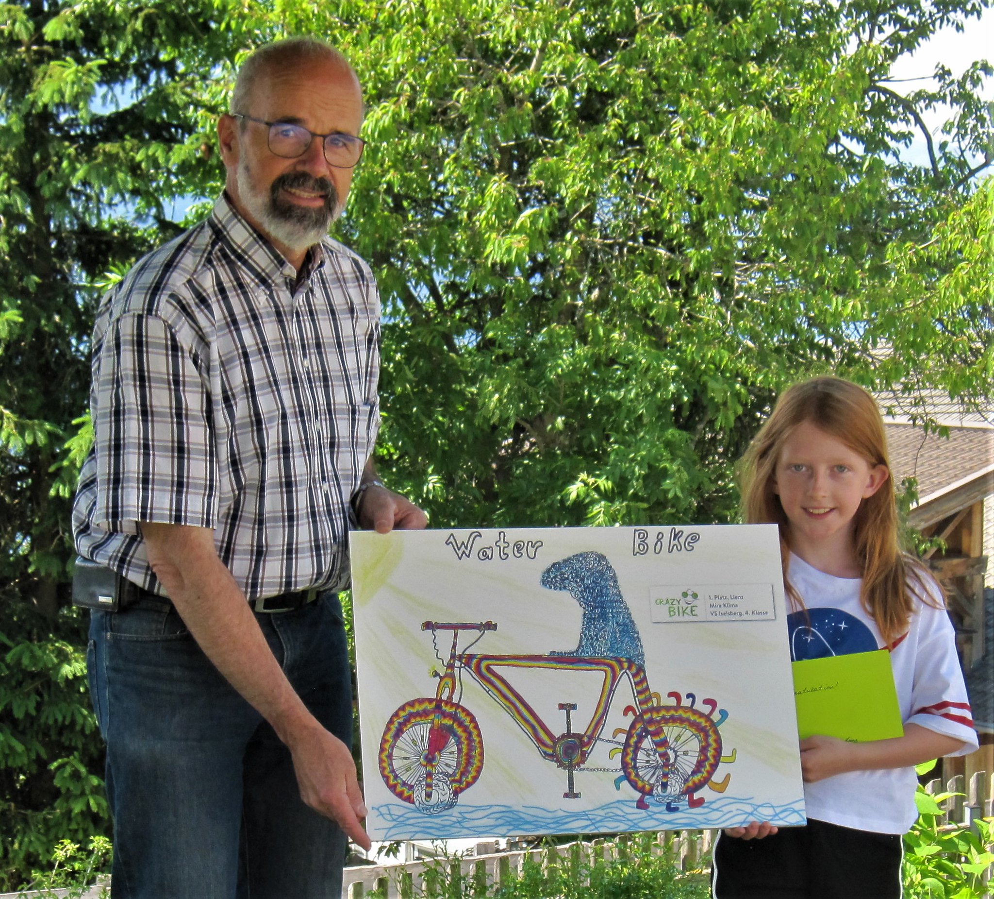 Dir. Thomas Haidenberger mit Bezirkssiegerin Mira Klima/VS Iselsberg